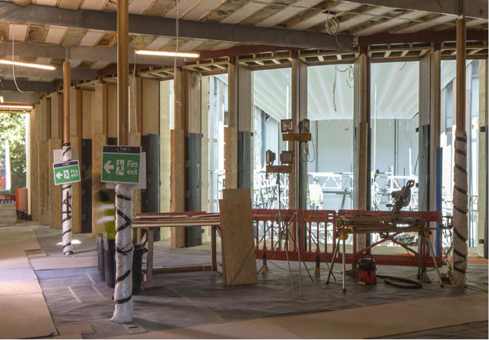 View looking into auditorium through the many entrance door openings
