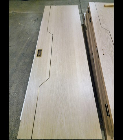 Linea brass inlay in door